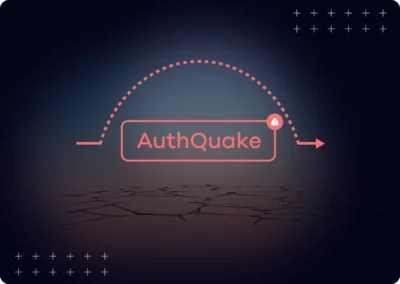 The image shows a dark, cracked earth in the foreground, suggesting a sense of vulnerability or fragility. In the background, there's a dark blue gradient that fills the space, punctuated by a grid of small plus symbols at the top and bottom, adding a technological or digital feel. A central element is a rectangular box with the word "AuthQuake" in a salmon-pink color, indicating a possible security breach. The box is connected by a dotted line to an arrow, implying movement or an ongoing process. The gradient background subtly transitions from dark to slightly lighter, creating depth.