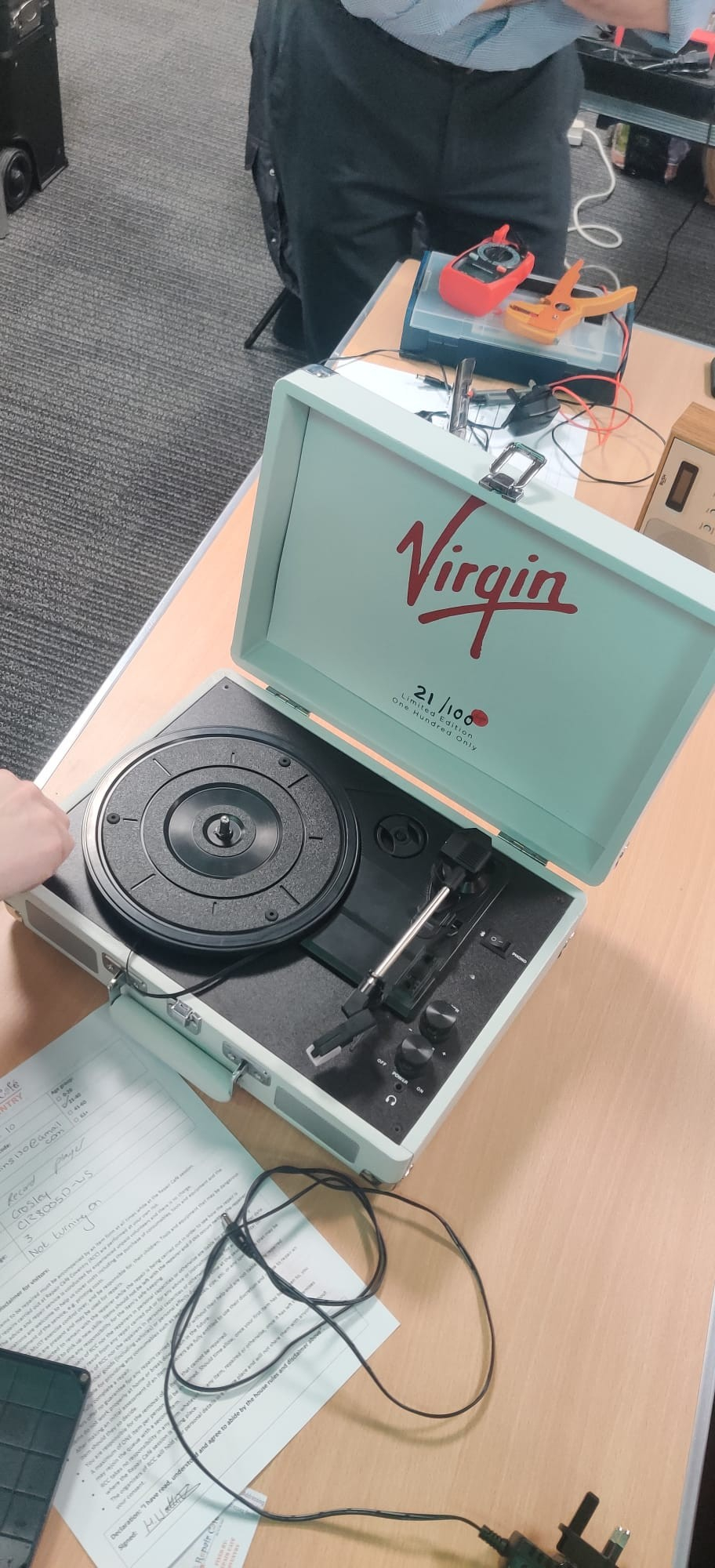 A cute record player. One of those that is in a kind of travelling case. It is a special edition branded 'Virgin' record player, numbered 21 out of only 100 that were made. It was given to the owner for her 21st birthday.