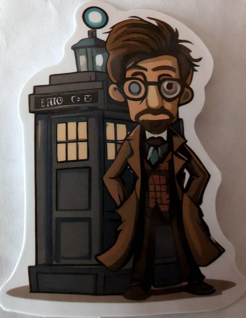 Weird drawing of the Doctor. 10cs coat, 11's hair. A beard. Glasses. the TARDIS is mishapen and has gibberish writing in it.