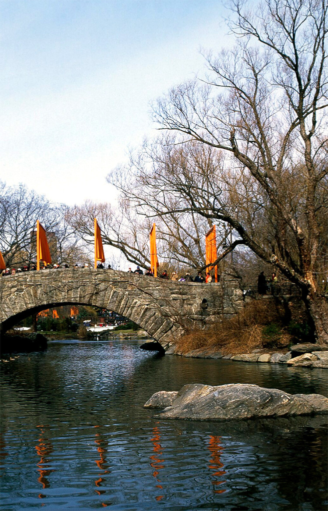 The Gates -- saffron cloth draped from large metal gates in Central Park over Gapstow Bridge -- a single arch stone bridge