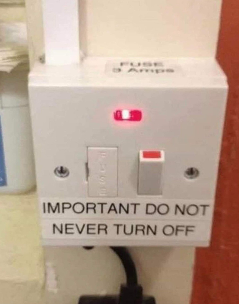 very confusing sign on a power box that says: Important do not never turn off