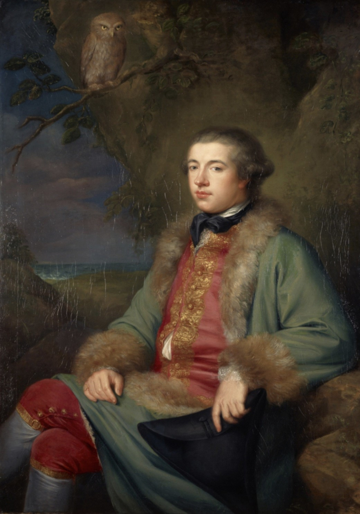 A portrait of James Boswell, painted by George Willison (1741–1797). Boswell sits side-on at the foot of a large tree, his head turned to the left to regard the viewer with a humorous expression. A young man, slightly plump in the face, he is wearing a large green fur-trimmed cape over a red waistcoat with gold frogging, red breeches (also with details picked out in gold) and white stockings, and a black silk cravat. His left leg is folded over his right and he carries a black tricorn hat casually in his left hand. A yellow-eyed, somewhat angry-looking owl is perched on a branch above him.