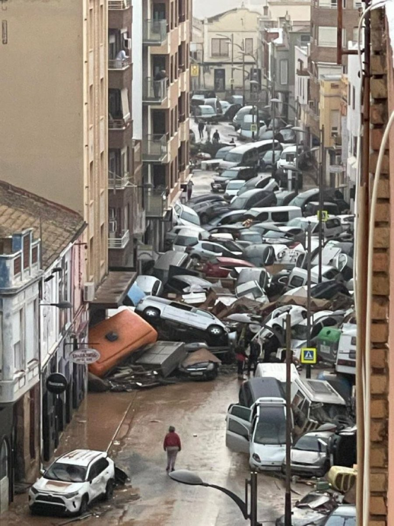 Picture: accumulation of cars piled up after the flood in Spain.