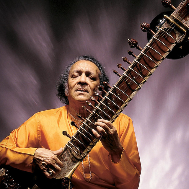 Ravi Shankar playing a sitar