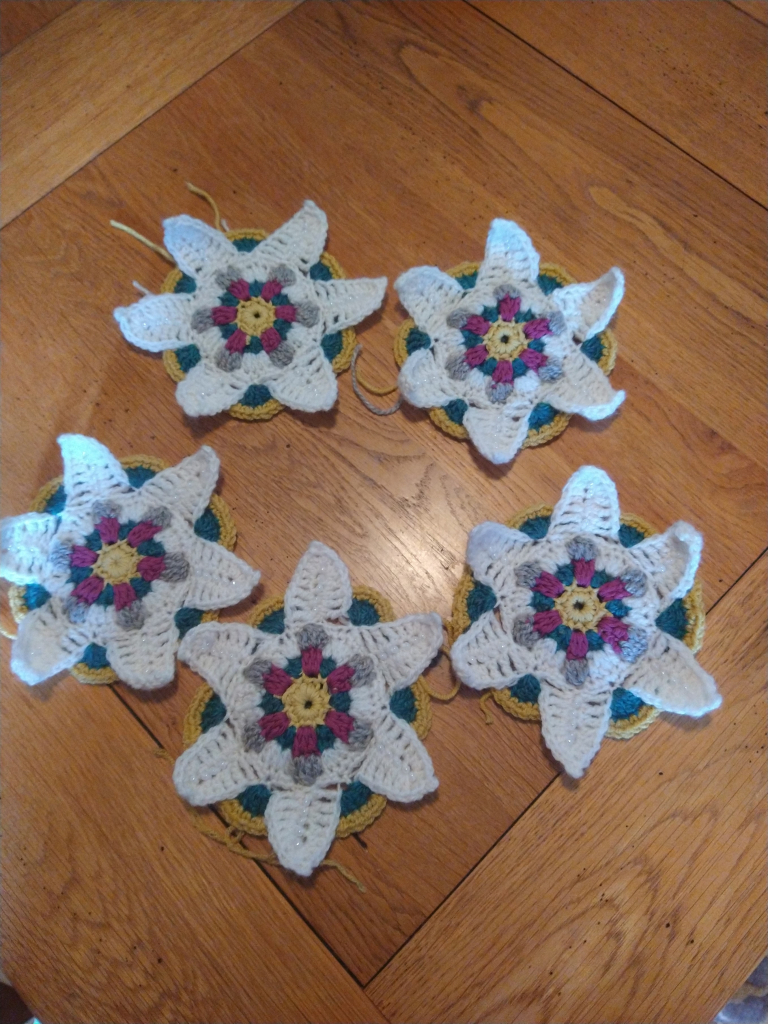 Five Virginia crochet motif flowers in a circle 