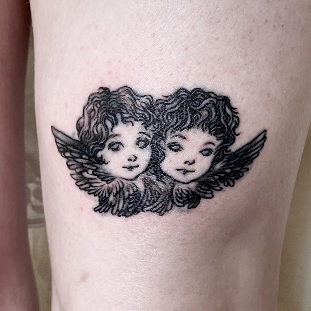 Cherub tattoo, freshly tatted