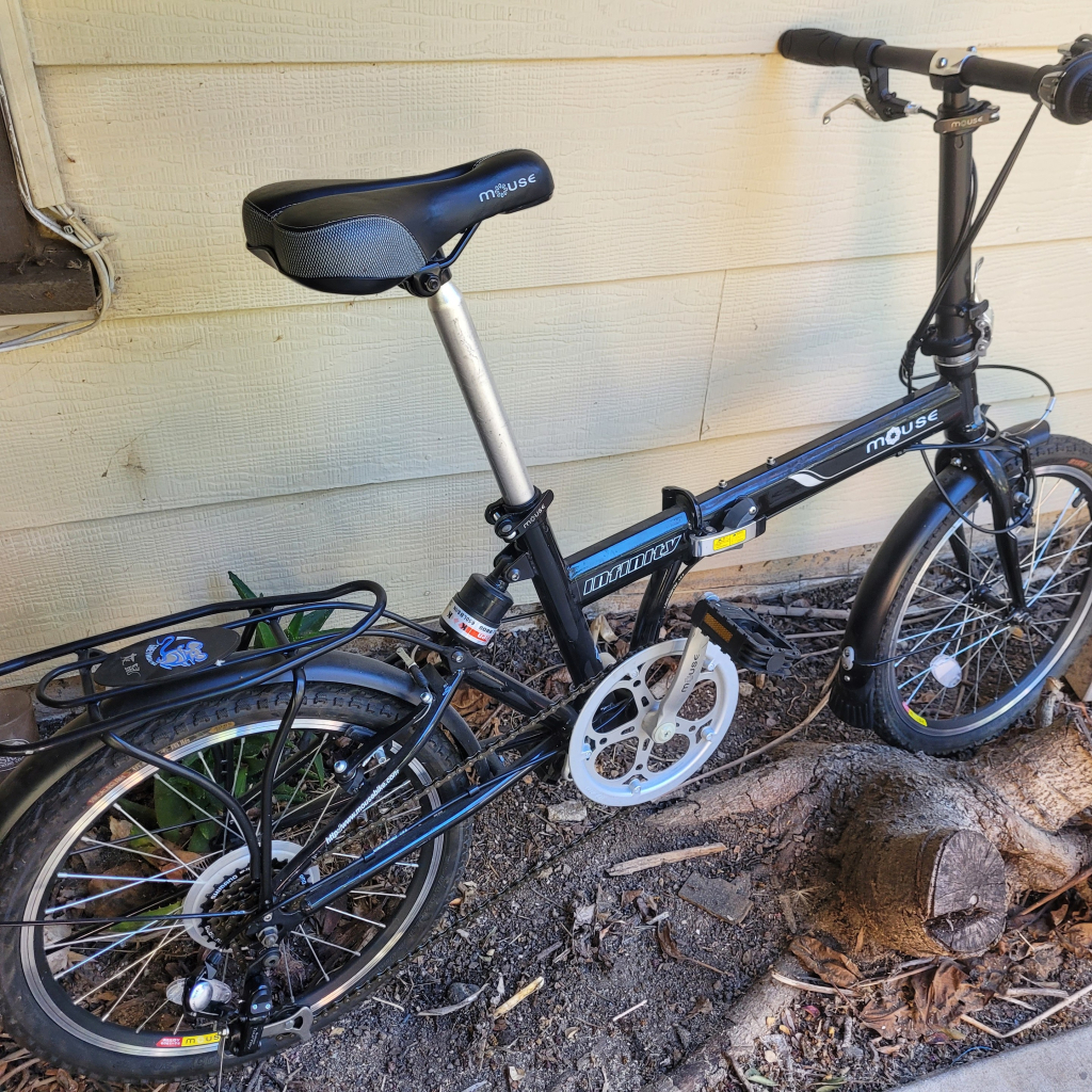 Folding bike against a house