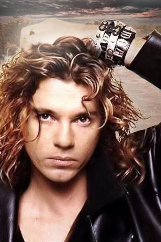 Colour image of Michael Hutchence of InXS in the video for Need You Tonight