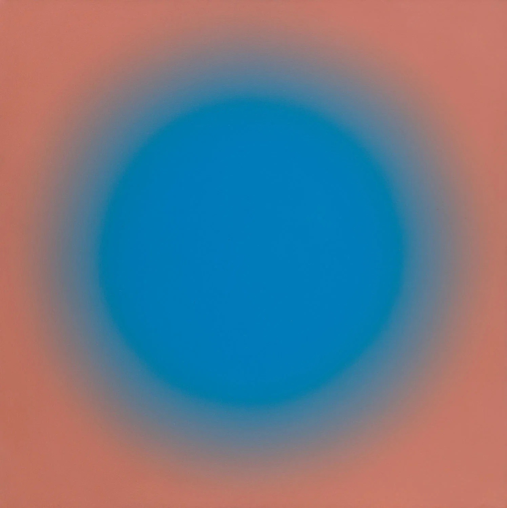 Painting of a blurry circle in light blue and salmon shades