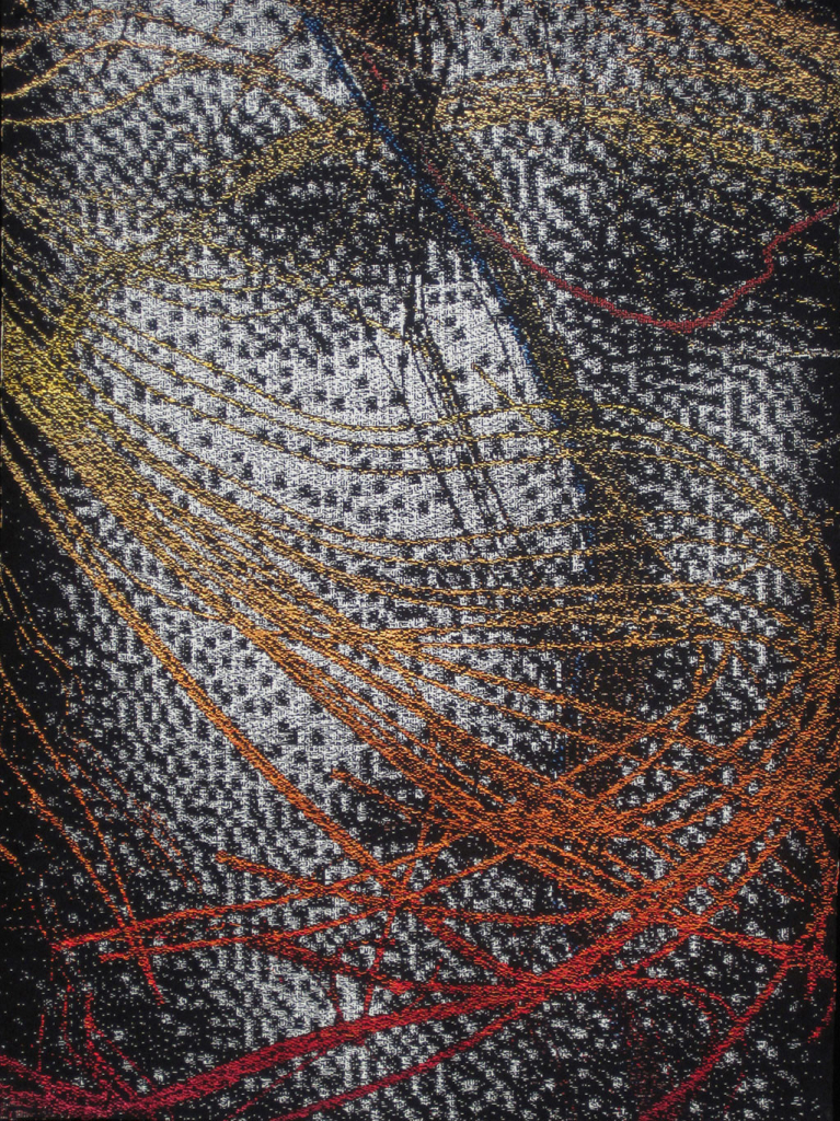 Textile portrait of a face in extreme close-up, overlaid with curving lines in yellow, orange, and red