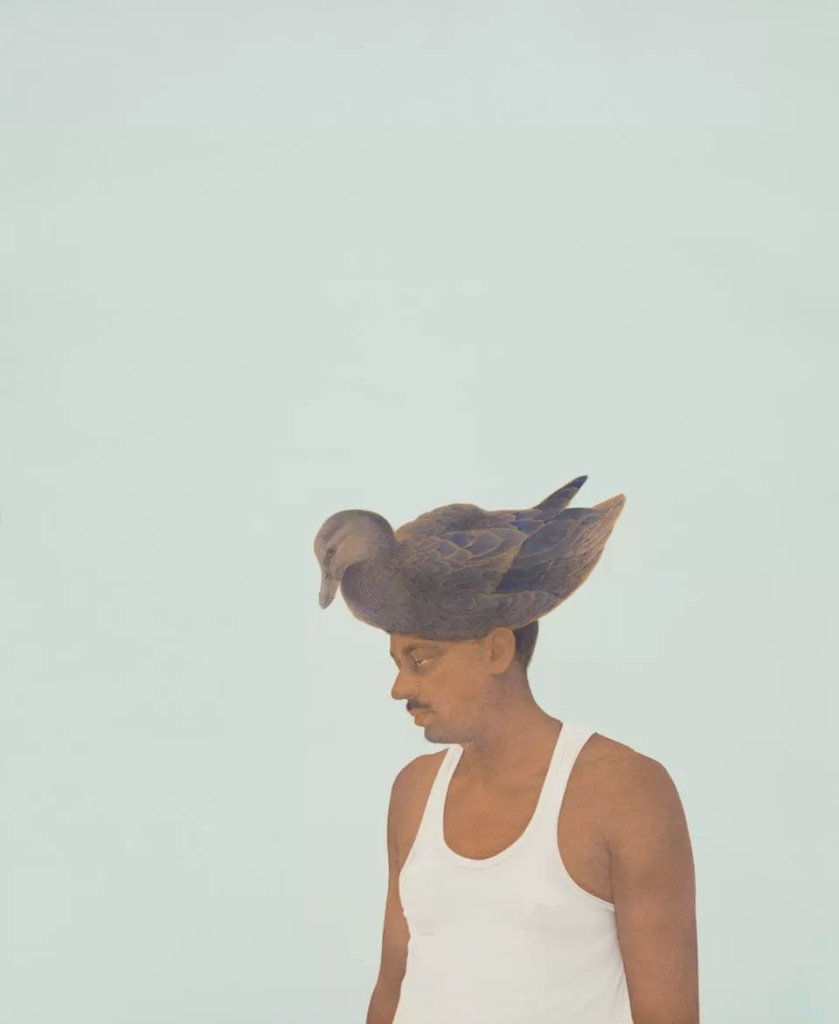 Watercolor portrait of a Brown man wearing a white sleeveless tank standing against a pale background, with a brown duck on his head