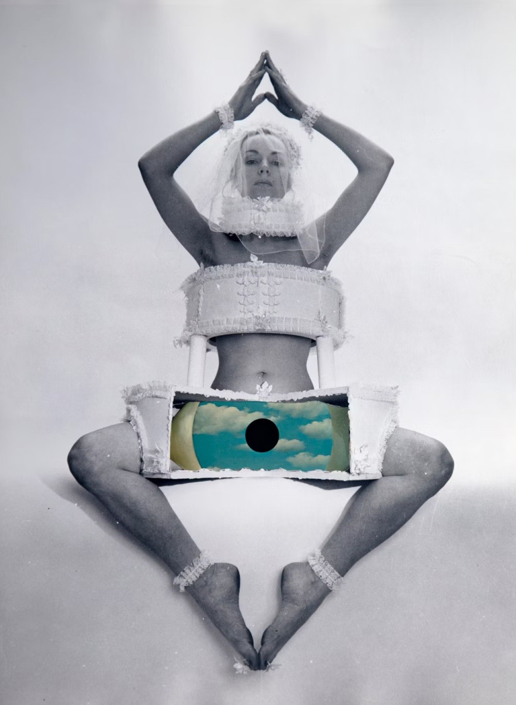 Collage of a grayscale white woman posed with arms splayed open and her arms over her head, inside a costume of a tiered cake. The lowest tier is a color image of Magritte's eye painting with clouds in the iris.