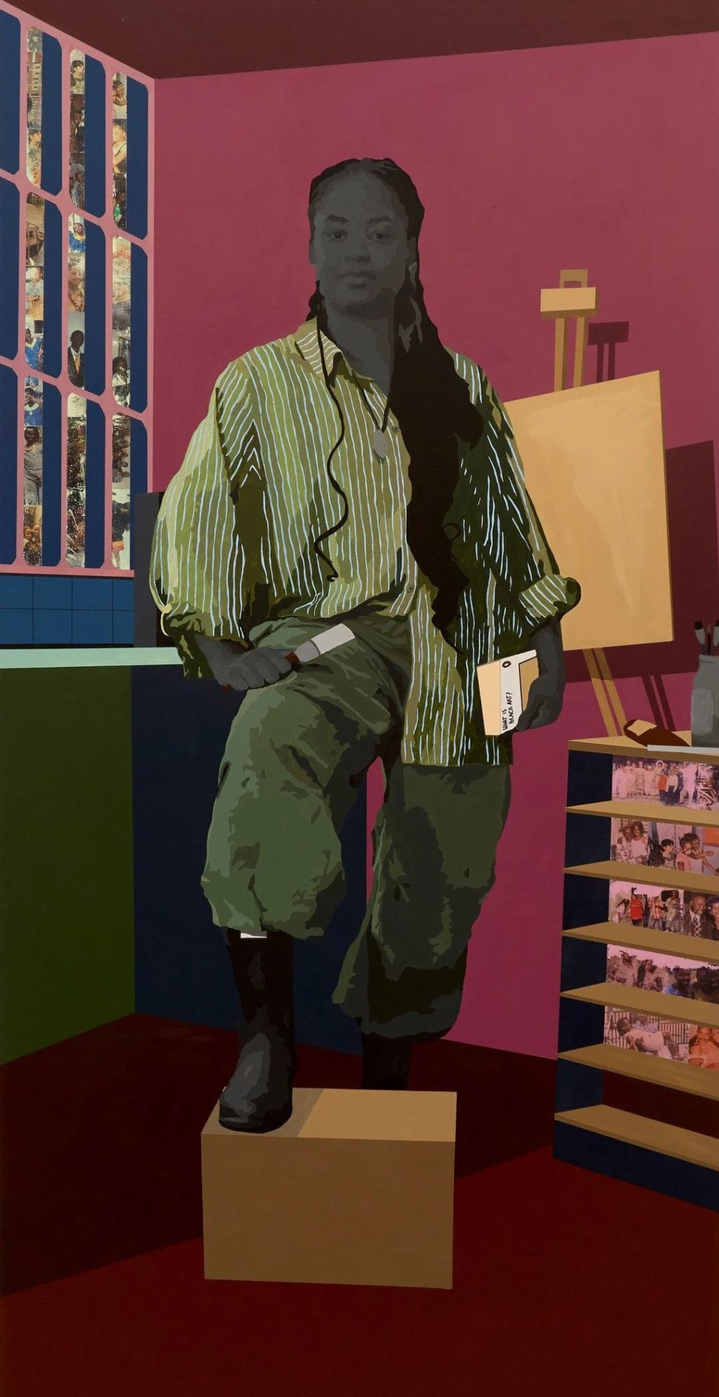 Painting of a young Black woman standing with her foot up on a box, wearing a green button down and pants, holding a paintbrush and a book, in a pink-toned room with an empty easel