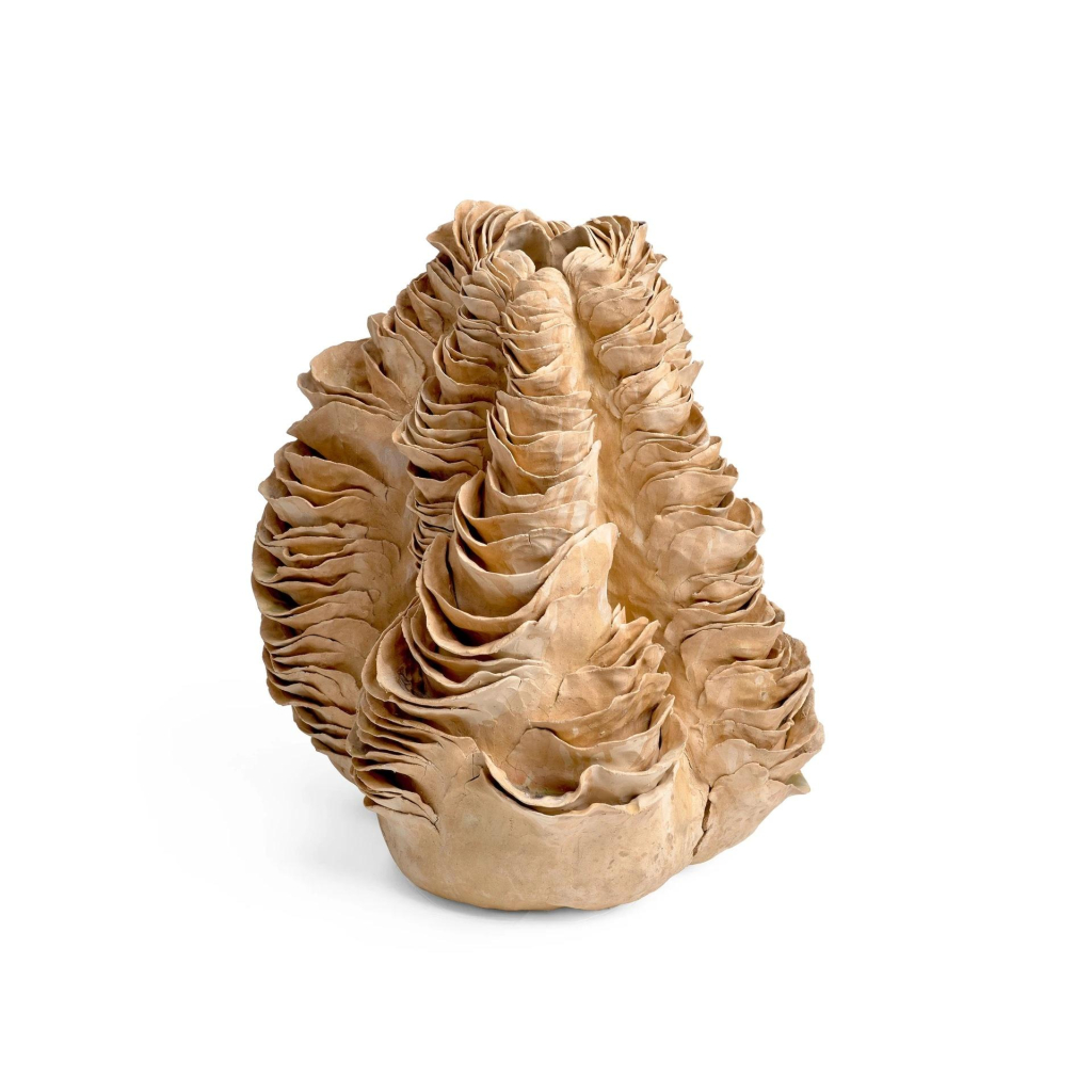 Abstract sculpture in monochromatic sepia, a rounded shape made up of folded-over sections