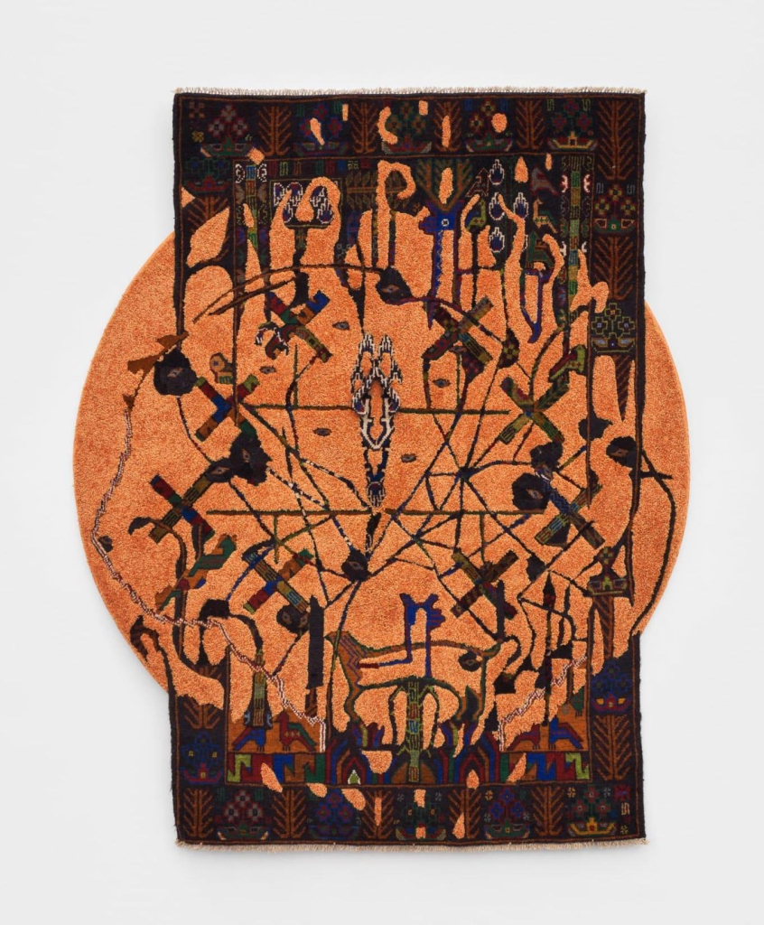 Hanging circular orange rug merging with a rectangular rug, with overlapping abstract motifs