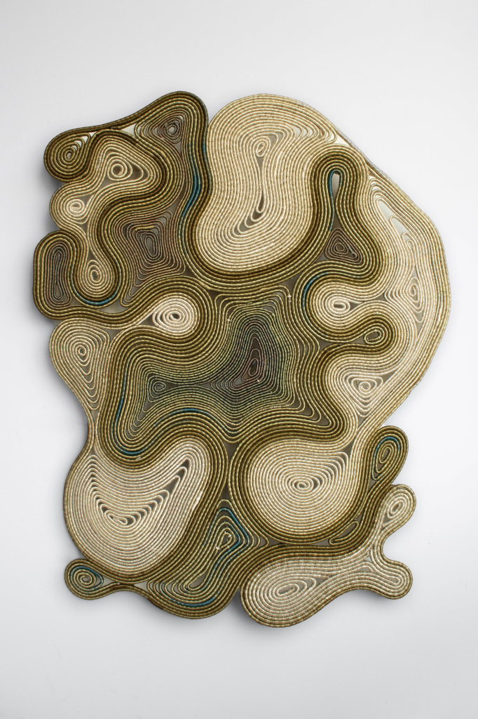 Abstraction in green, brown, and cream made up of layers of curving textile lines