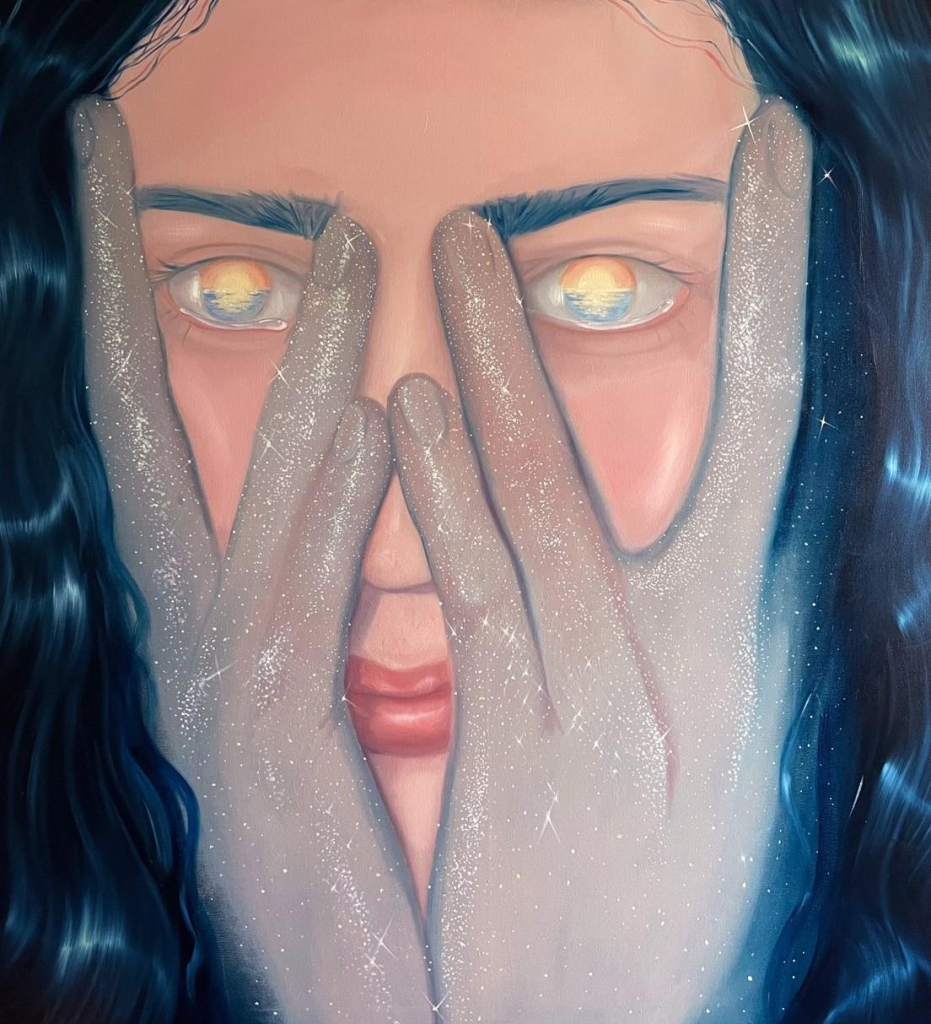 Painting of a white woman with dark hair shown in closeup, her hands are sparkling silver and held up to her face covering her cheeks. Her eyes each hold a small seascape with a setting sun.