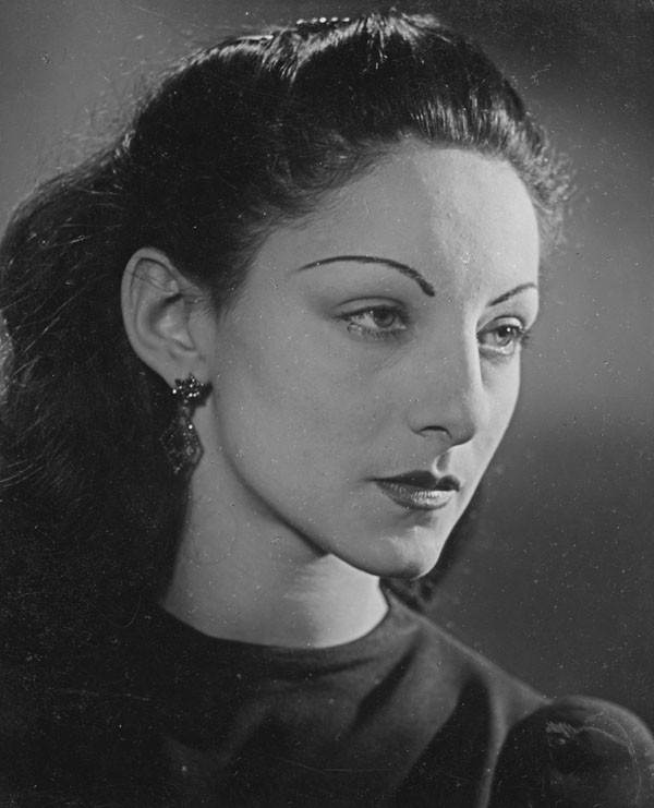 Black and white studio photo of Celia Franca in the 1950s. She is a white woman with dark hair.