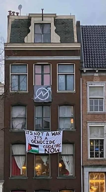 amsterdam squat "its not a war, its a genocide, ceasefire now"