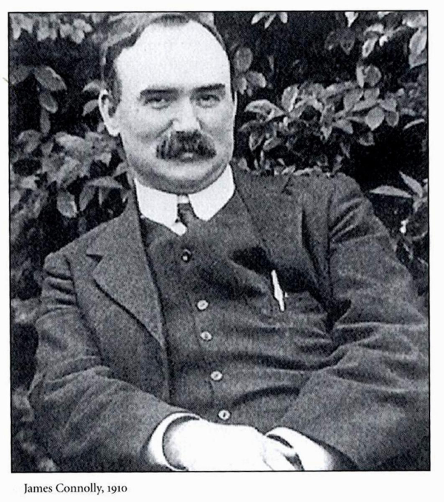 Famous portrait of James Connolly where he is grinning, from the "I fuckin warned ye" meme.