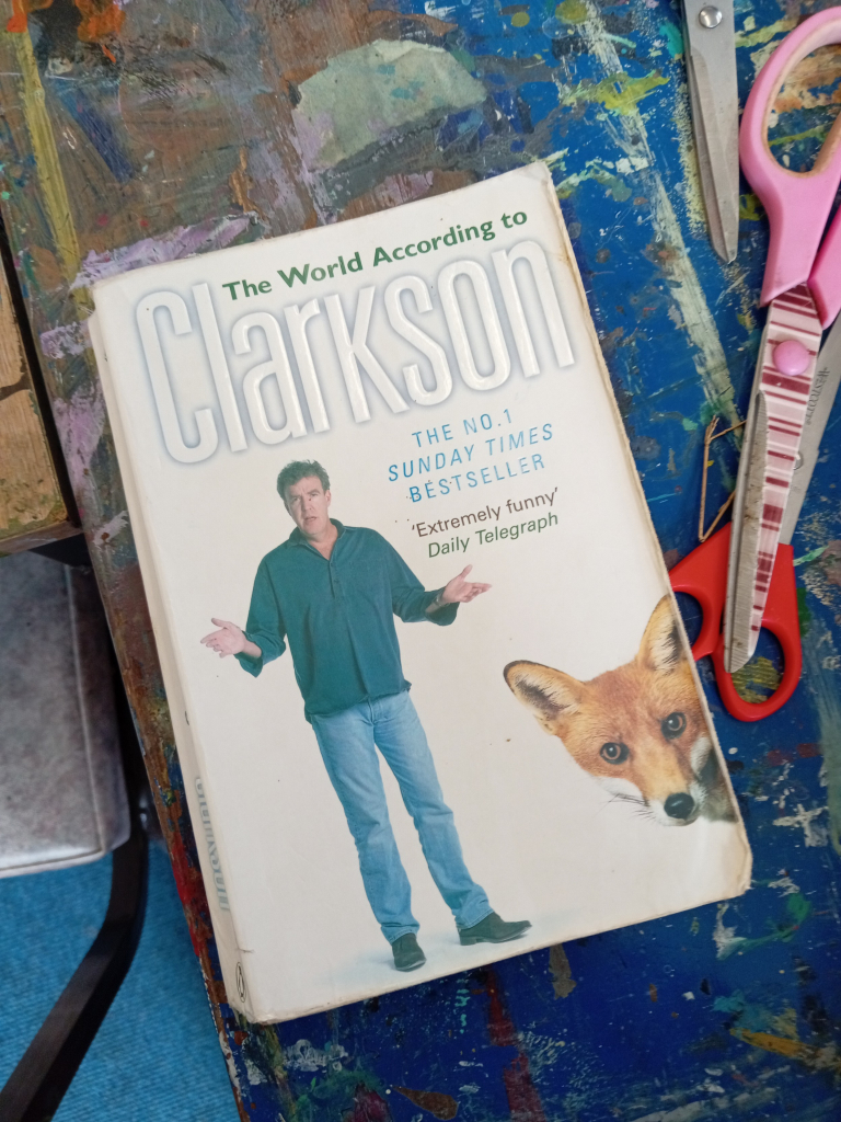 Paperback book. "THE World According to Clarkson No. 1 times best seller"

Middle aged arsehole looking outraged

Fox's head.