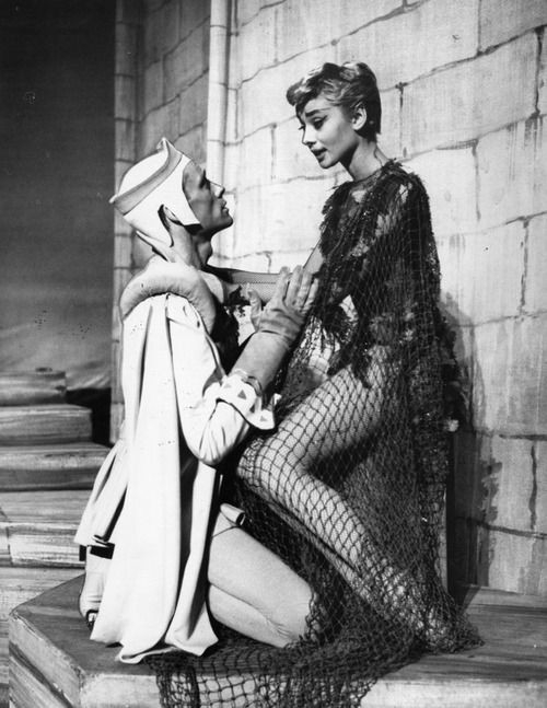 Audrey, dressed in fishnets and seaweed, plays a Water Nymph in a 1954 production of Ondine. 