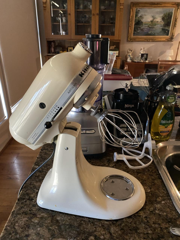 The big cream kitchenaid standmixer is out on the bench waiting to whip the egg whites into soft peaks.