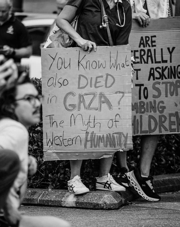 A sign that reads: "you know what also died in Gaza? The myth of Western humanity"