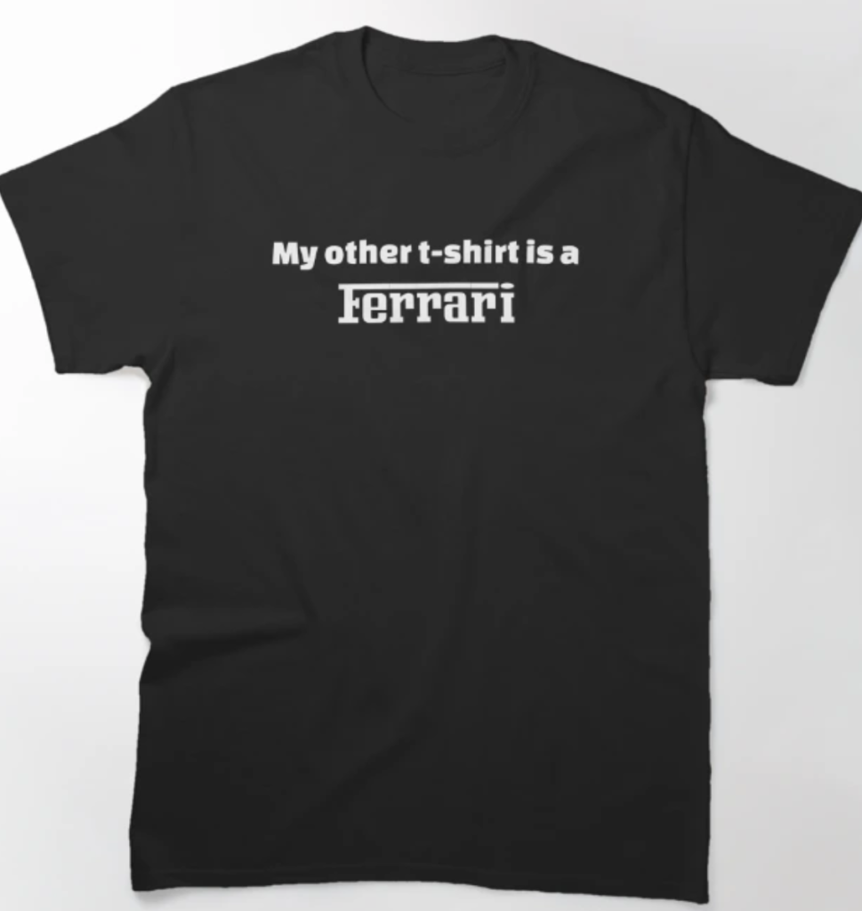 Black t-shirt that says:
My other t-shirt is a Ferrari