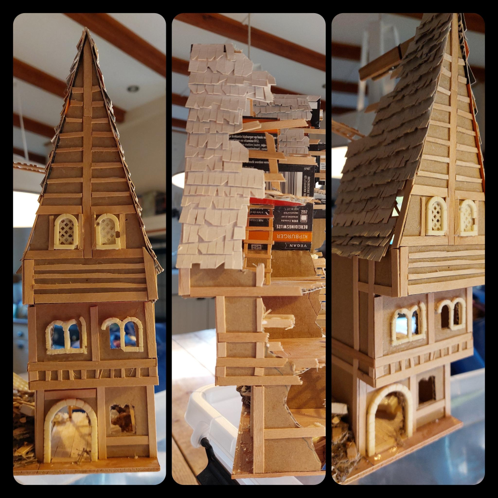 mordheim ruin WIP: medieval timber frame townhouse with an extremely sharp gable. everything is made out of coffee stirrers, cardboard and some resin bits