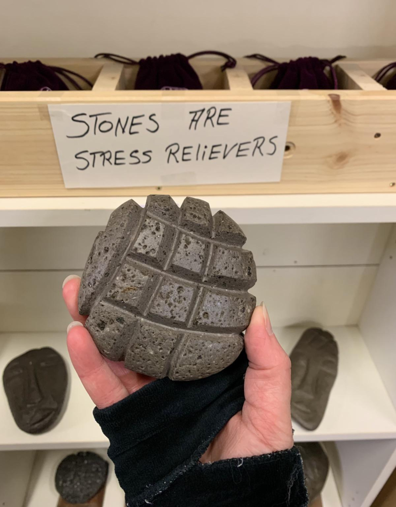 “Stones are stress relievers” (carved volcanic rocks)