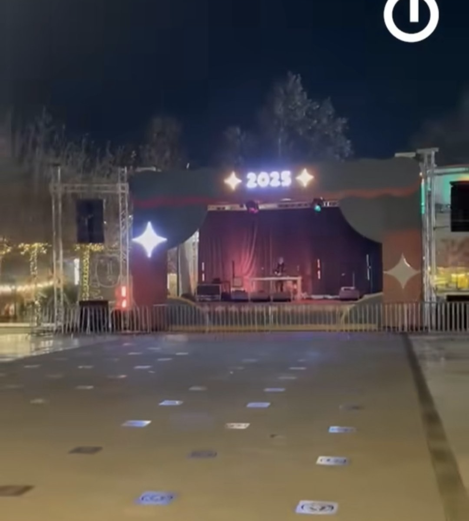 Stage of Christmas concert in Tbilisi Georgia. A band plays to zero people.