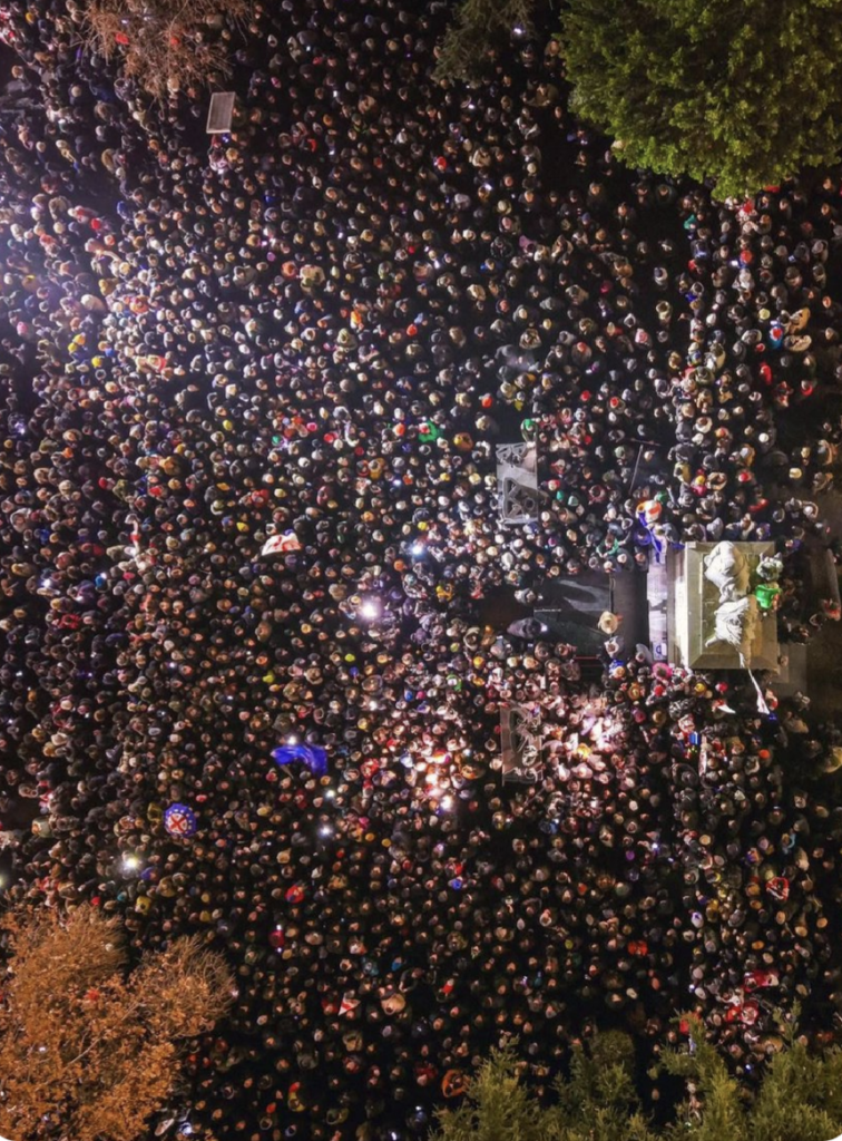 Aerial shot of Salome Zourabichvilli addressing a huge crowd of protestors in Tbilisi, Georgia.

Photo by Ezz Graber