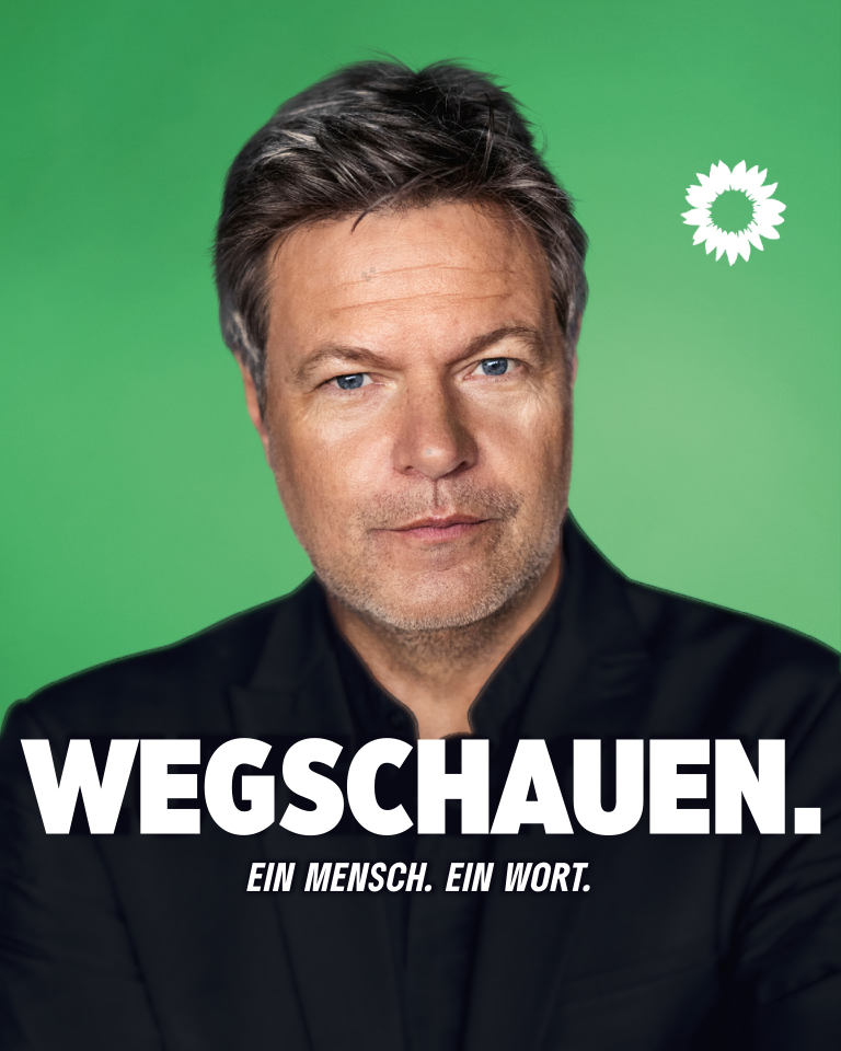 Ein Wahlplakat mit grünem Hintergrund und einer weißen Sonnenblume oben rechts. Im Hintergrund Robert Habeck, der in die Kamera blickt. Davor ein Schriftzug "Wegschauen.", darunter ein kleiner Untertitel: "Ein Mensch. Ein Wort."