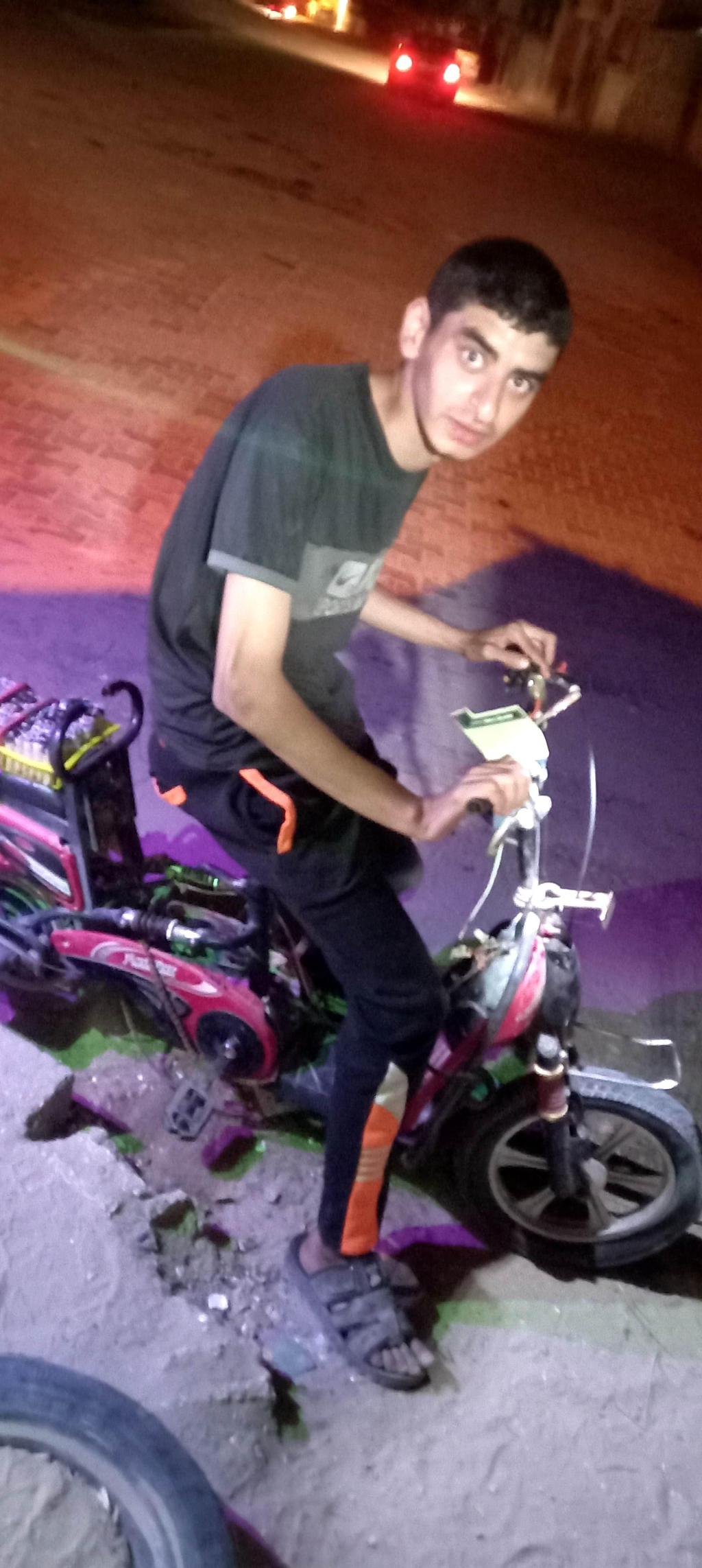 Photo of Ramy on his eBike. The eBike has since been destroyed.