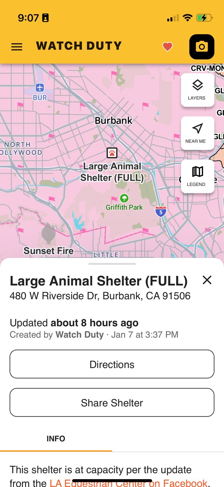 Screenshot of Watch Duty app

Shows pink map of Burbank with a marker for Large Animal Shelter (FULL). Sunset Fire marker on the lower left.

Below, a panel is open with details about the shelter: 480 W Riverside Dr, Burbank, CA 91506, Updated about 8 hours ago, Create by Watch Duty Jan 7 at 3:37 pm

Directions (button)

Share Shelter (button)

Info: This shelter is at capacity per the update from the LA Equestrian Center on Facebook (link)

(On the upper right of the screen, options to select layers, Near Me and legend.)

