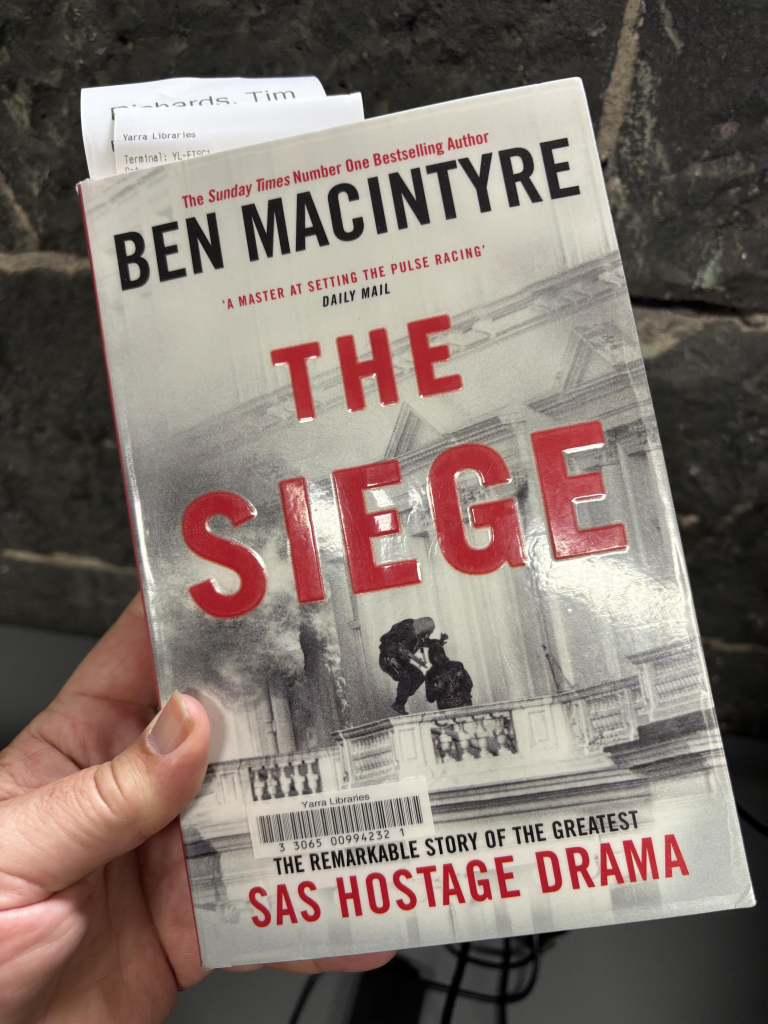 Cover of a paperback copy of The Siege.