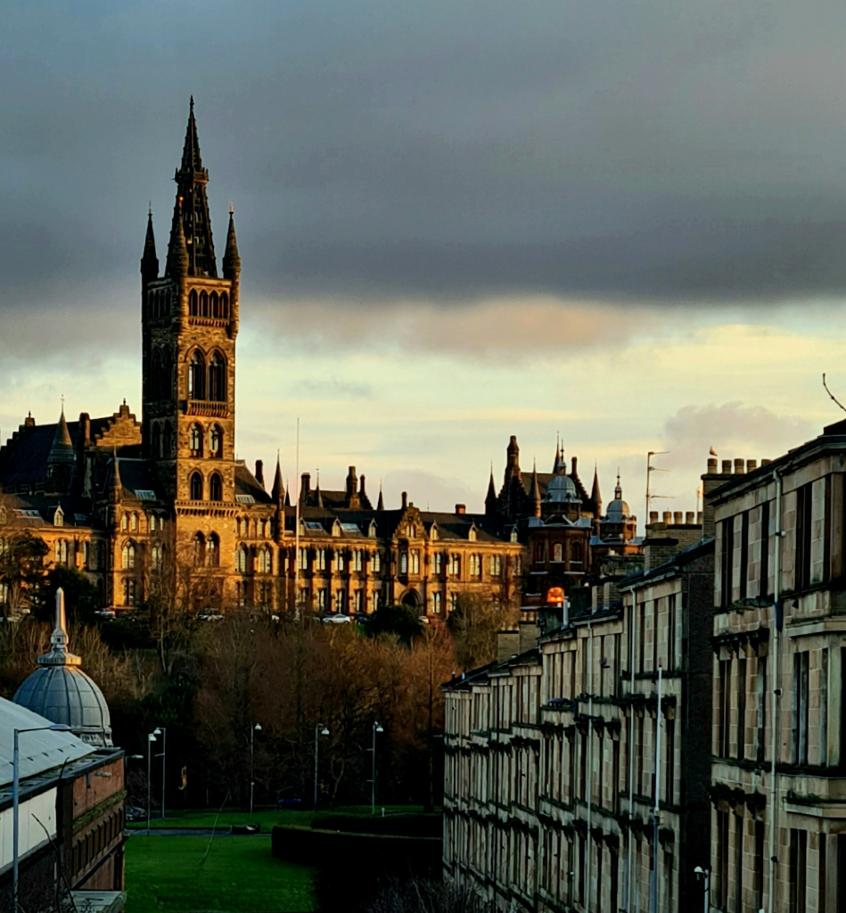 The gothic buildings of Glasgow University in the early morning light.