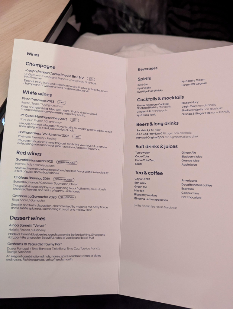 Photo of ay in-flight drinks menu from a Finnair flight. There are three different blueberry based items.