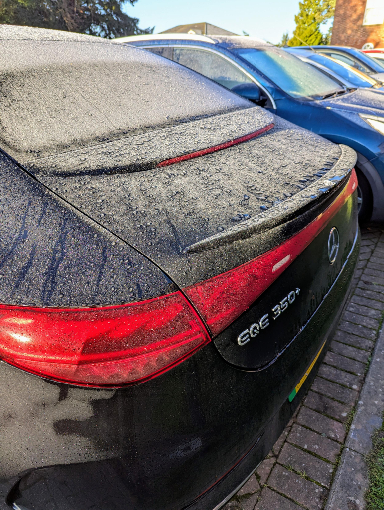 Photo of the boot area of a Mercedes EQE, showing a significant accumulation of ice.