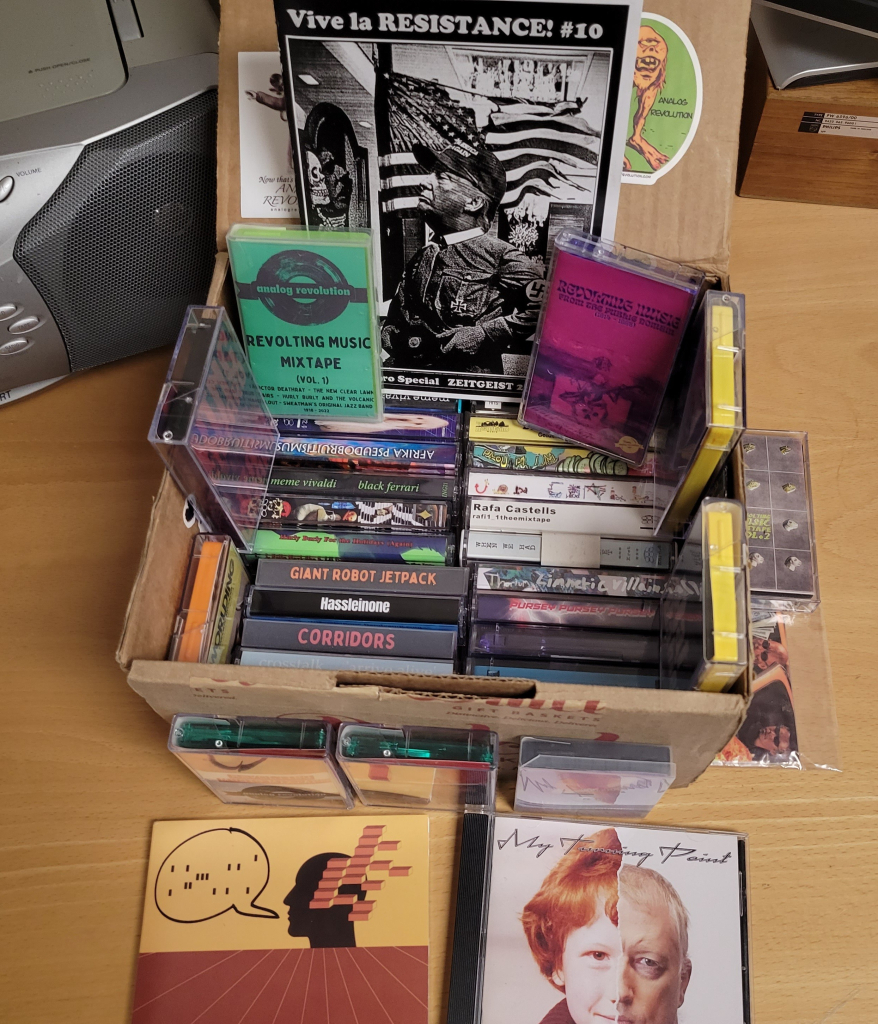 Box of cassettes and cds