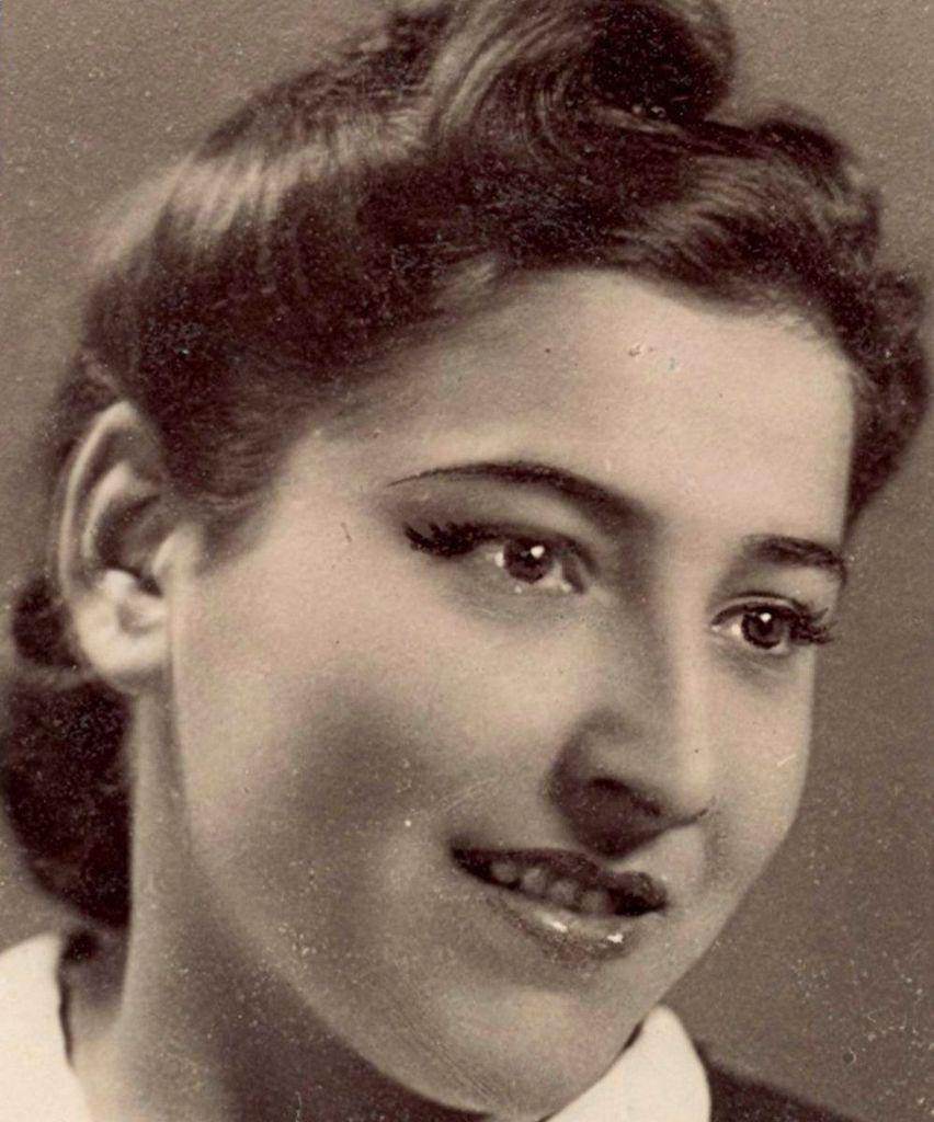 Vintage portrait of a woman with a gentle smile.