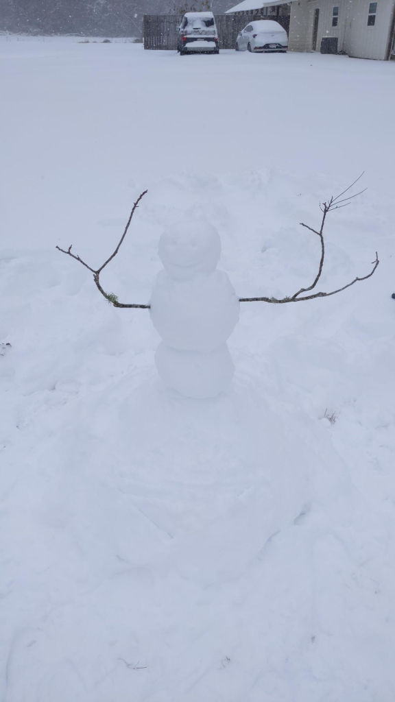 Snow person with a round face