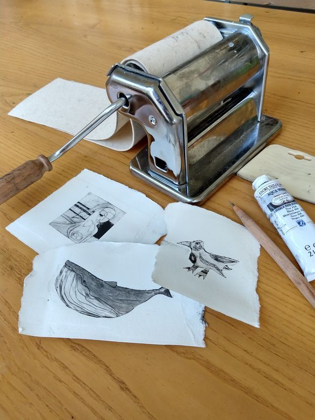 The photo shows a crank pasta machine used as a hand printing press.