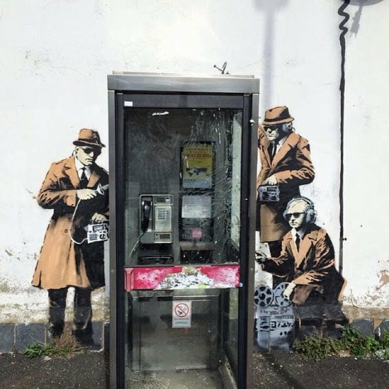 Banksy Street Art
"Phone box spies" 