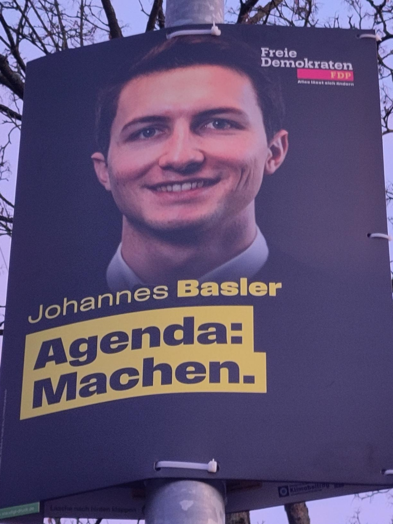 FDP-Wahlplakat für den Politiker Johannes Basler mit dem Wahlslogan
"Agenda:
Machen"