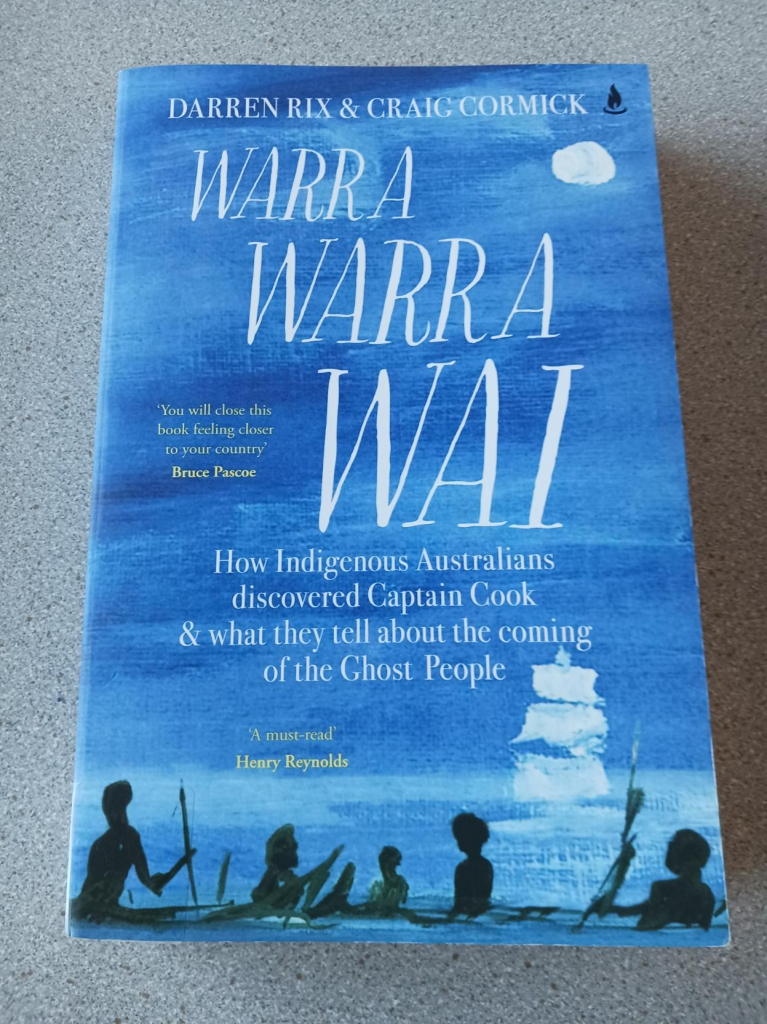 Blue softback book cover with white writing. Warra Warra Wai: How Indigenous Australians discovered Captain Cook & what they tell about the coming of the Ghost People, by Darren Rix and Craig Cormick