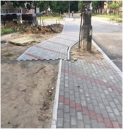 brick sidewalk that stops abruptly before a lamp-post, and begins immediately feet to the left  (an OCD nightmare)