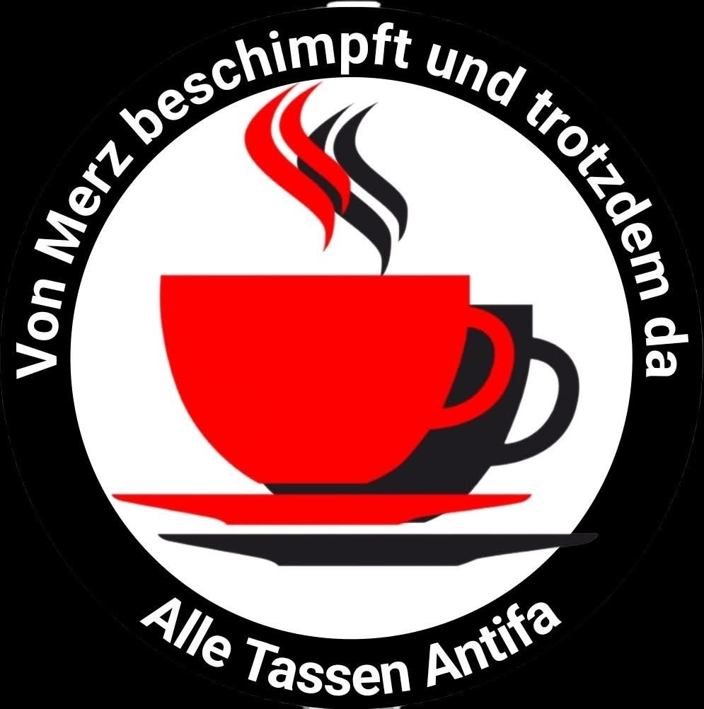 The image features a logo depicting a red coffee cup with steam rising from it, surrounded by a circular black background. The text in German reads "Von Merz beschimpft und trotzdem da" and "Alle Tassen Antifa"