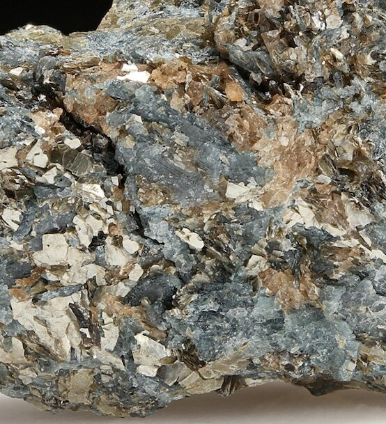 A crop of a photo of a rock containing blue sapphirine (along with muscovite and quartz). From near Nuuk, Greenland.
https://www.mindat.org/photo-1122517.html
copyright Harold Moritz